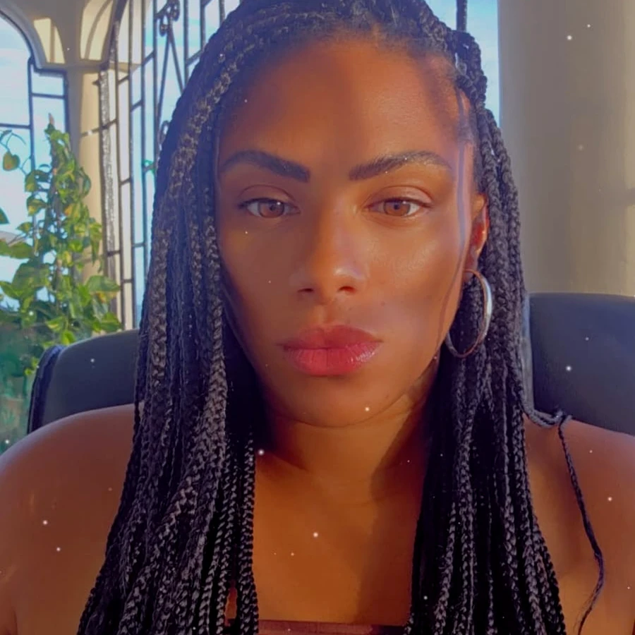 Founder of We Are S.A.I.N.T.S., portrait with soft gold halo